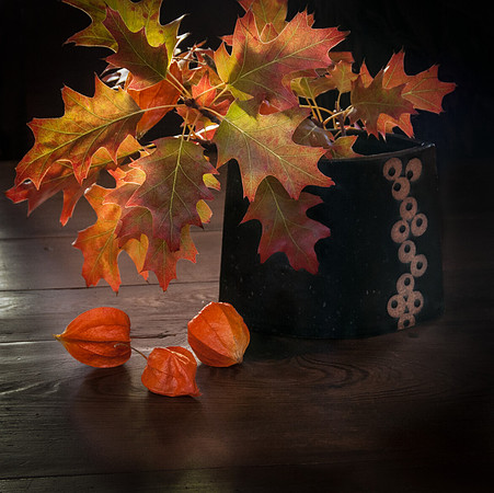 Still life with fall leaves, vase and  flowers